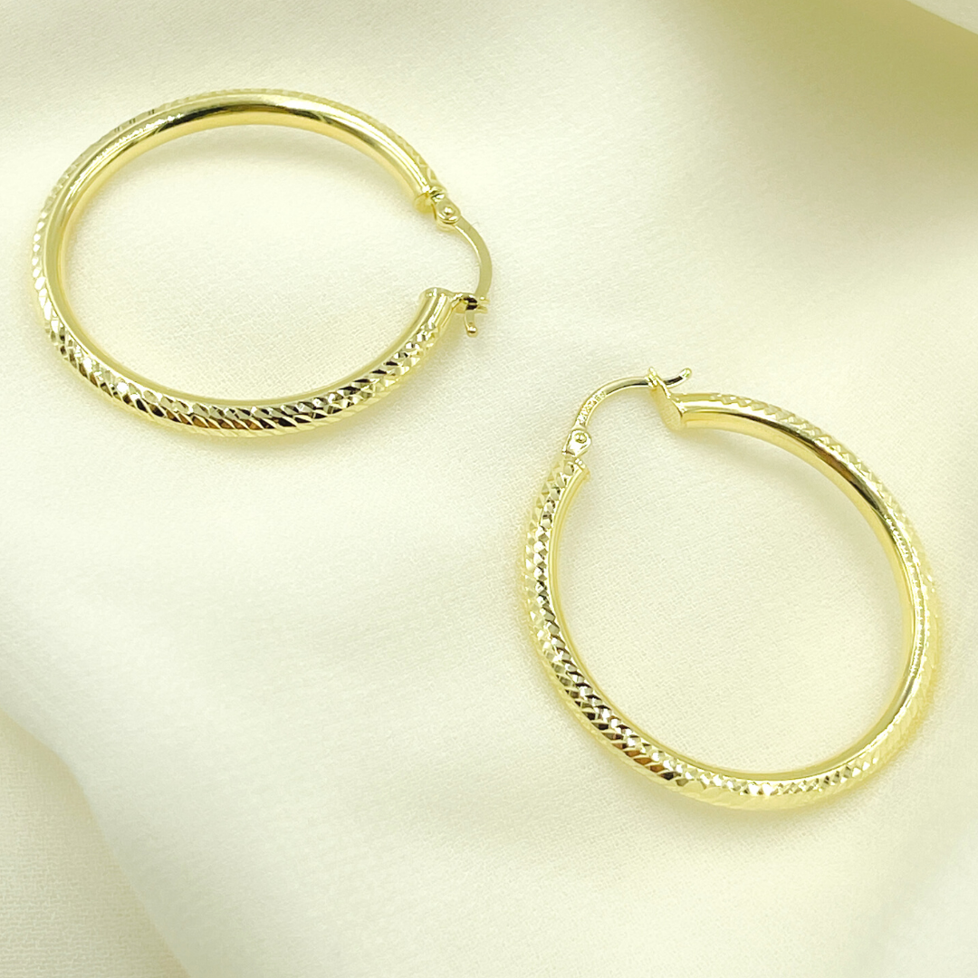 14K Gold Hoop Earrings with Engraved Tornado Design.