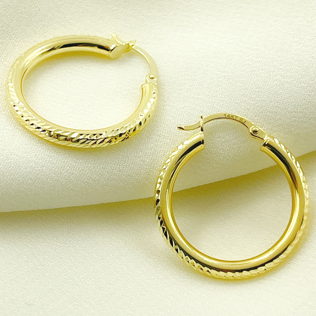 14K Gold Hoop Earrings with Engraved Tornado Design. 