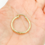 Load image into Gallery viewer, 14K Gold Hoop Earrings with Engraved Tornado Design. 