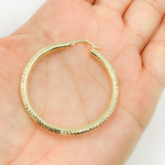 Load image into Gallery viewer, 14K Gold Hoop Earrings with Engraved Tornado Design. 
