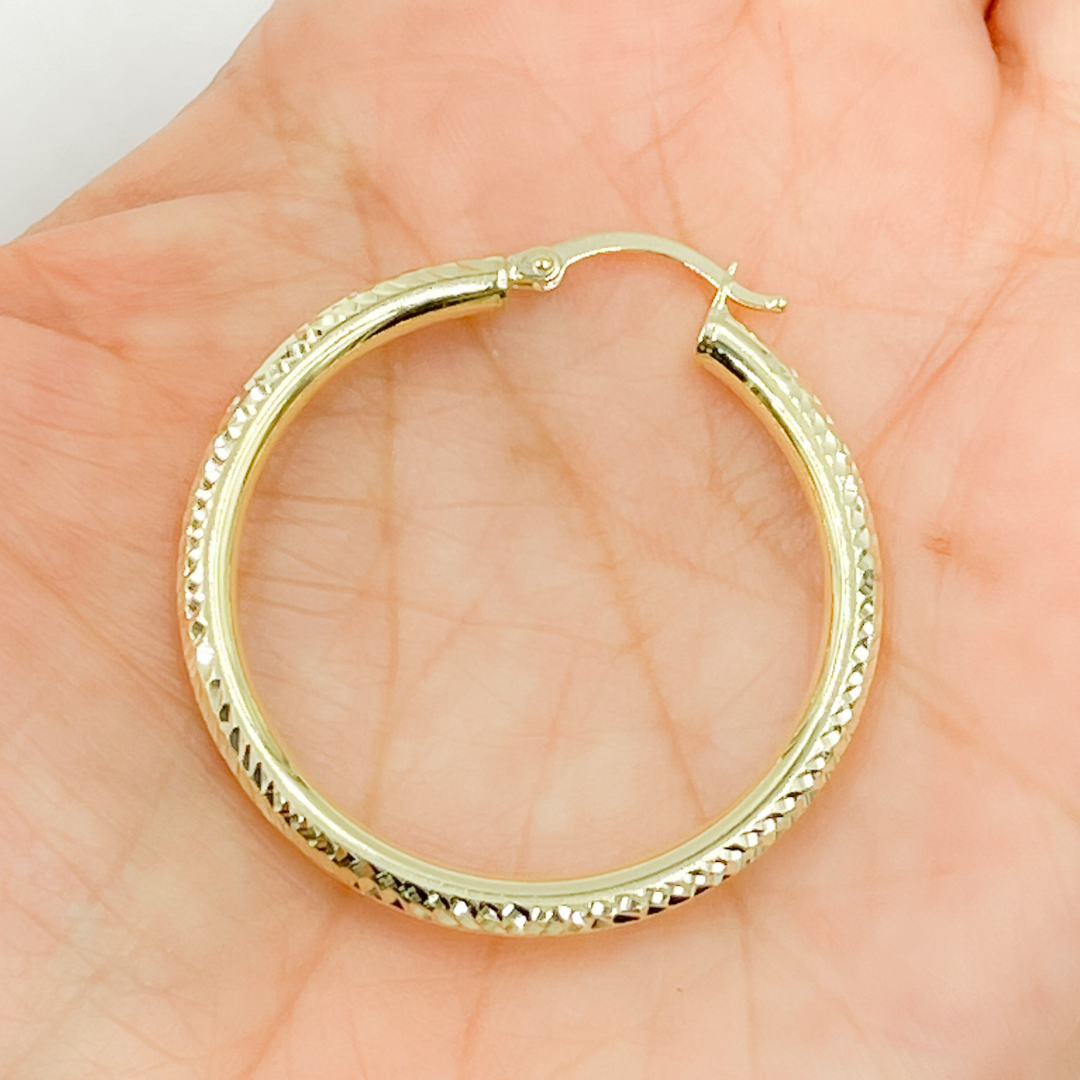 14K Gold Hoop Earrings with Engraved Tornado Design.