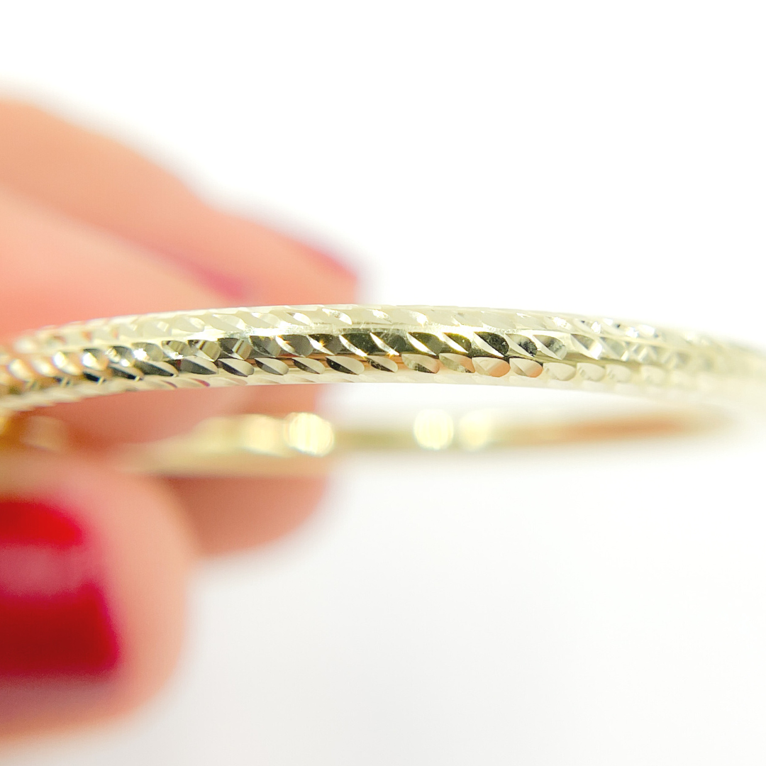 14K Gold Hoop Earrings with Engraved Tornado Design. 
