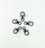 Load image into Gallery viewer, 0925NTC1WRBR. 8mm Black Rhodium Trigger Claps
