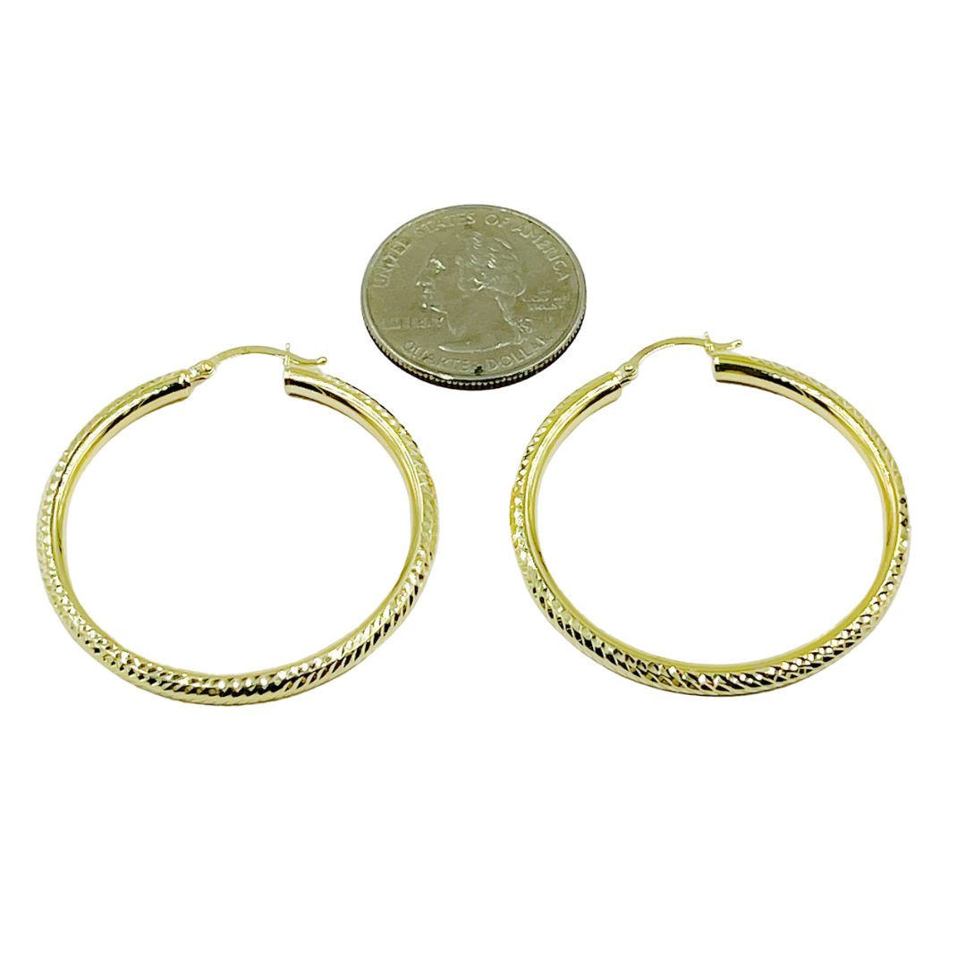 14K Gold Hoop Earrings with Engraved Tornado Design. 