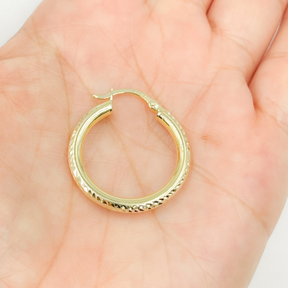 14K Gold Hoop Earrings with Engraved Tornado Design. 