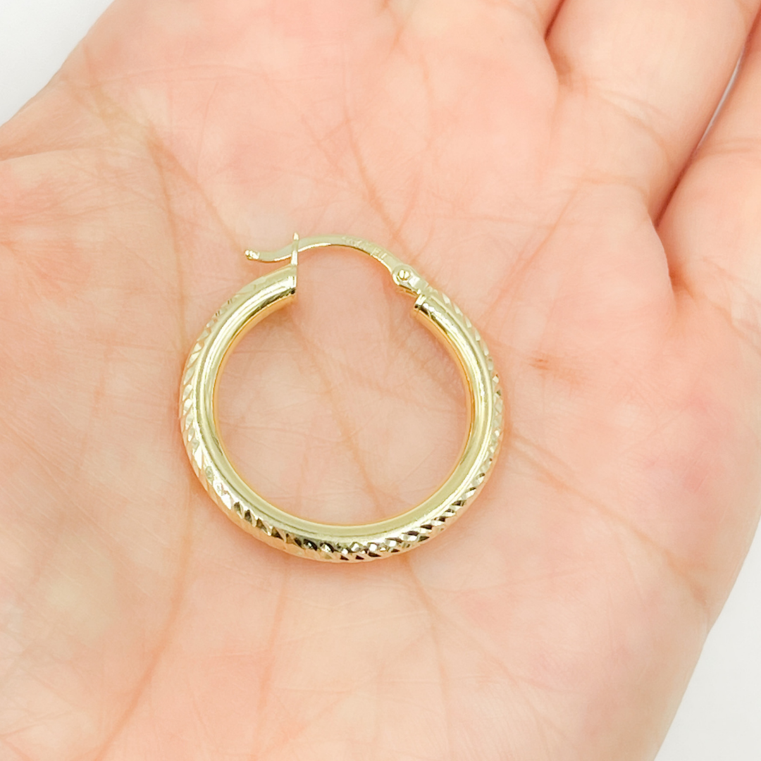 14K Gold Hoop Earrings with Engraved Tornado Design. 